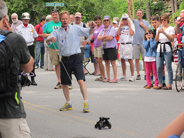Clive's cannon starts the parade. Photo: Peggy McGrath