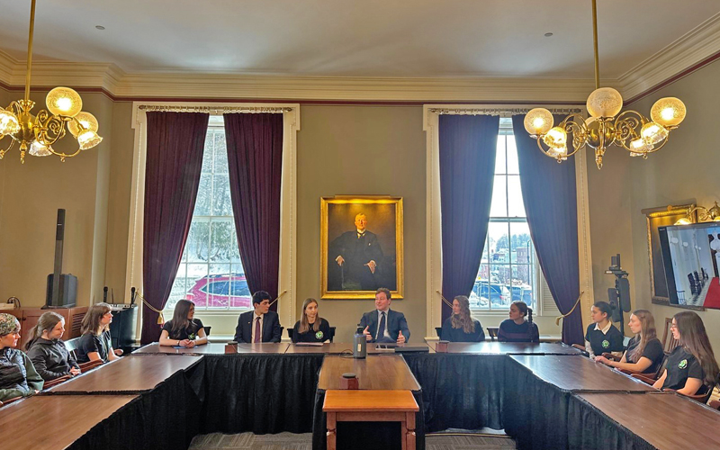 Treasurer Piecak wYouth Lobby members Harmony, Cora Potts, Emily Hill to far right Photo from Youth Lobby